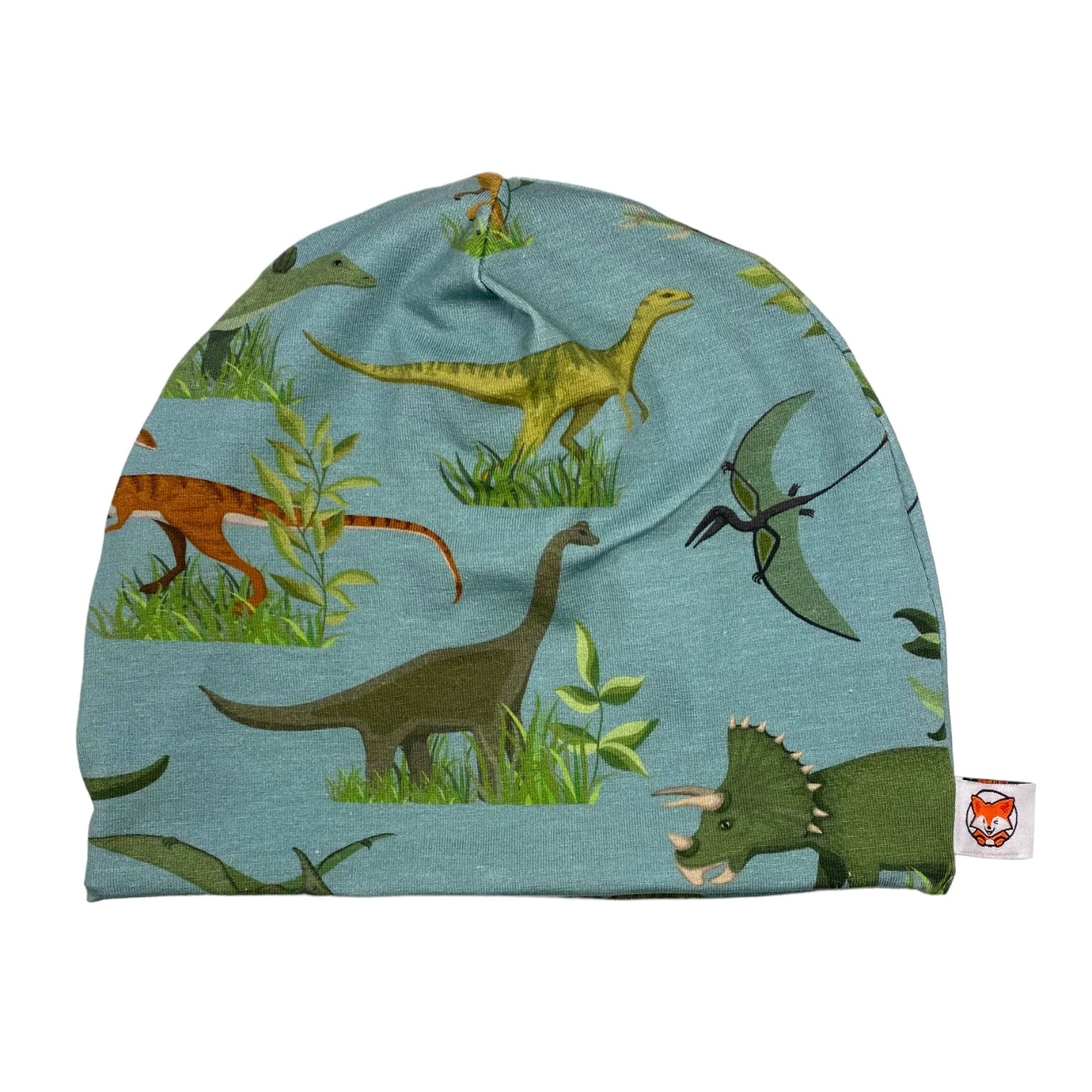 Jerseytyg Dino i grönt, sytt till en mössa