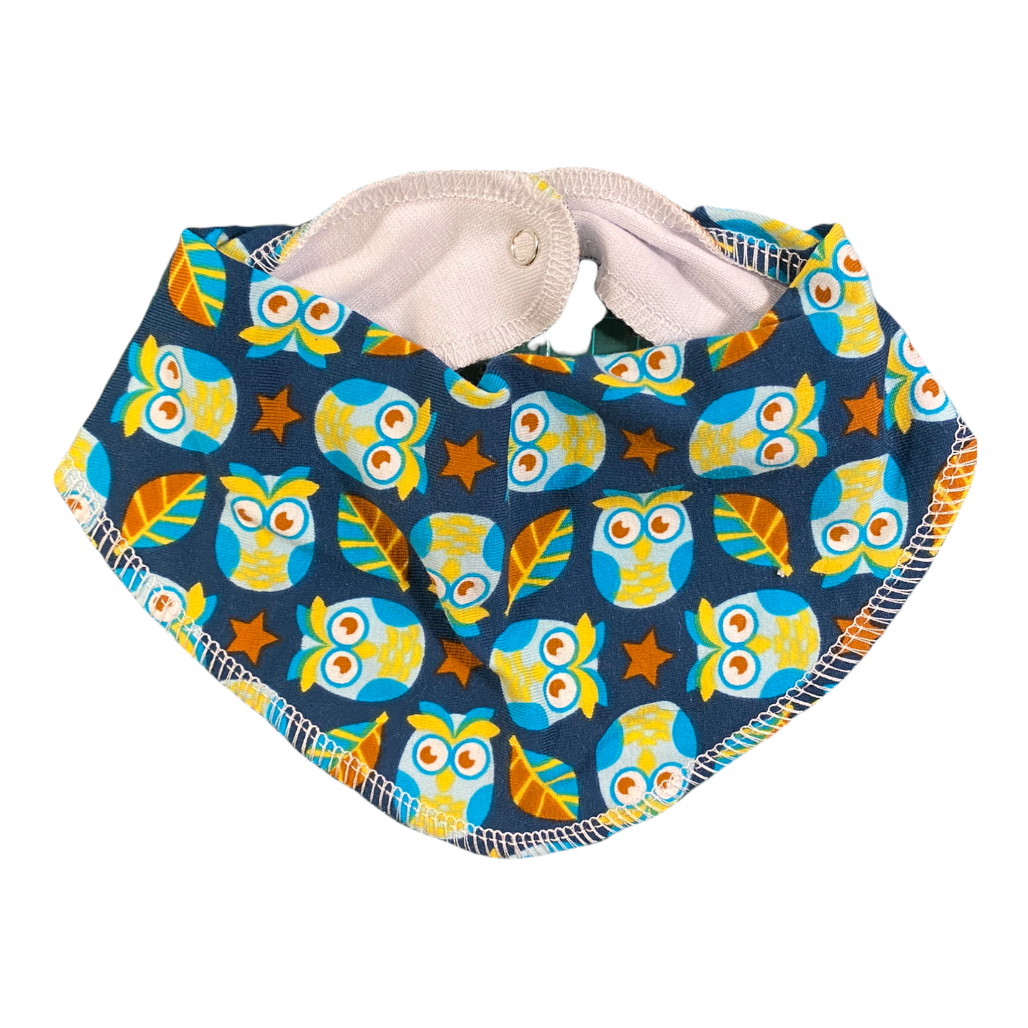 Dregglis för baby i blått med ugglermönster, dubbelt tyg med tryckknapp bak.