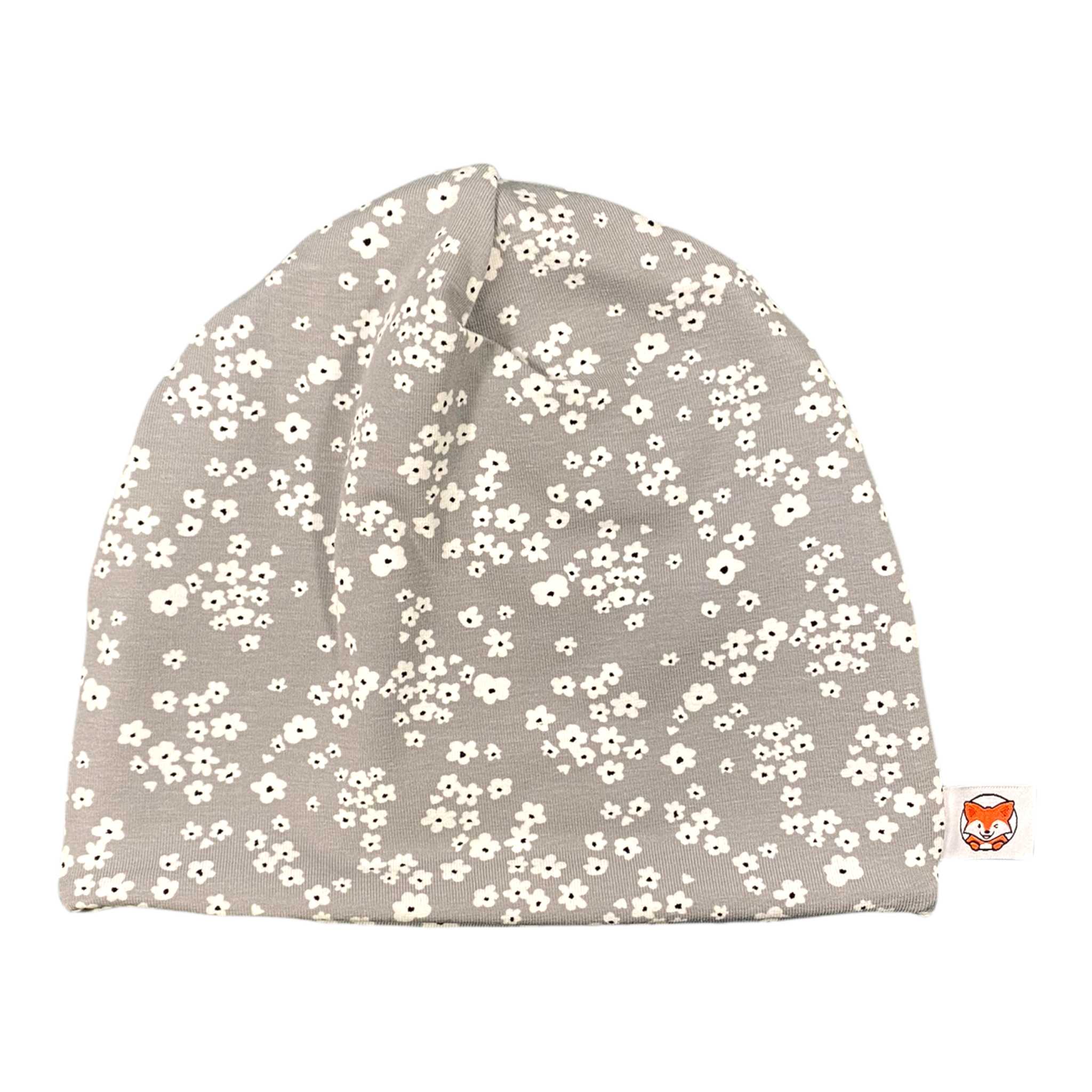 Mössa för barn med små vita blommor och mjukt bomullsfoder.